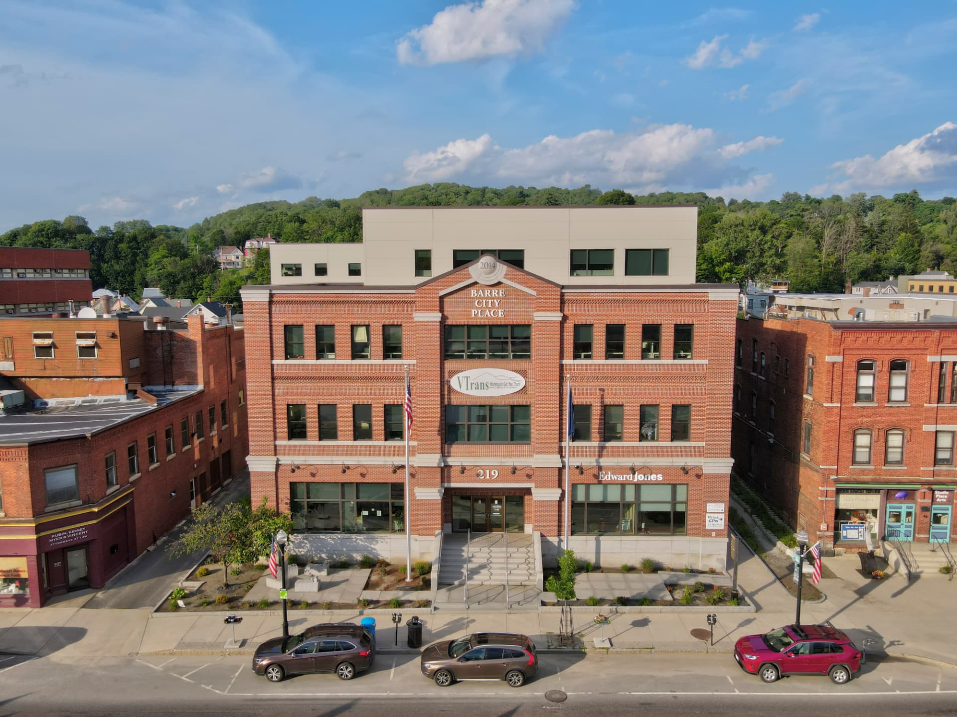 Aerial view of the brick Barre City Place office building on Main Street